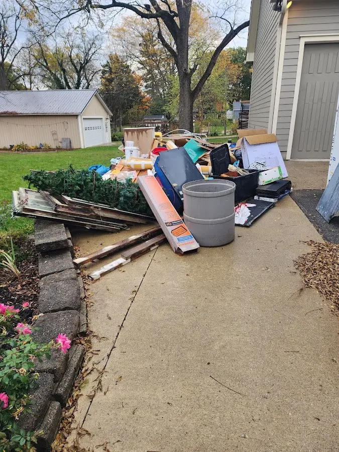 Dumpster being loaded with debris for Roofing Dumpster Rental in La Riviera